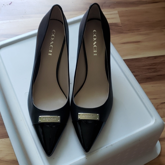 Coach Shoes - Coach Zan black heels with patent toe silver tag
